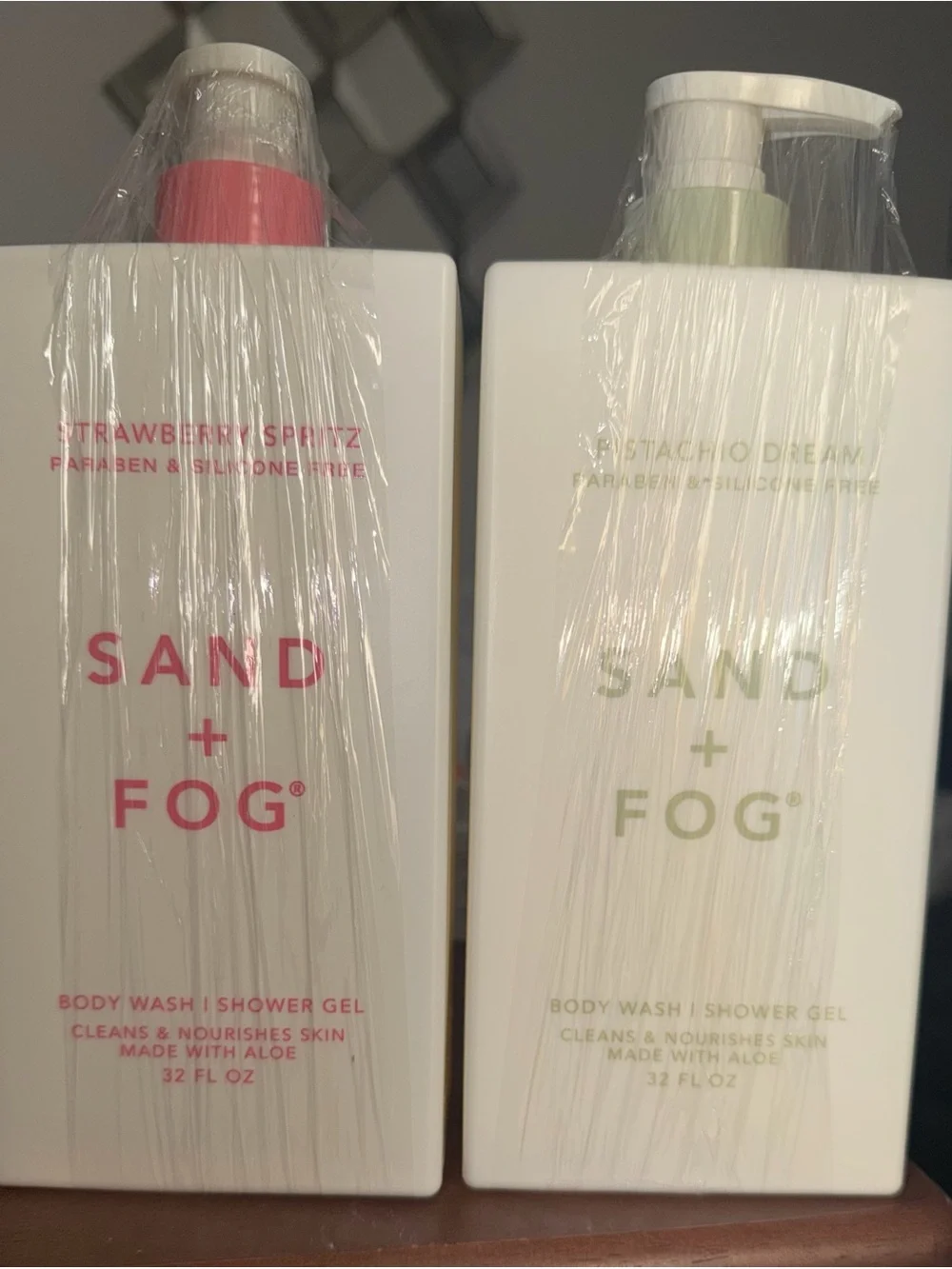 SAND + FOG Strawberry Spritz and Pistachio Dream body wash. 32 ounces each.